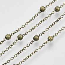 Honeyhandy Brass Coated Iron Cable Chains, Satellite Chains, with Brass Round Beads, Soldered, with Spool, Flat Oval, Antique Bronze, 2.2x1.7x0.7mm, about 39.37 Feet(12m)/roll