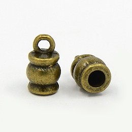Honeyhandy Tibetan Style Terminators, Barrel, Lead Free & Nickel Free & Cadmium Free, Antique Bronze, 11x6.5mm, Hole: 2mm, Inner Diameter: 3mm.