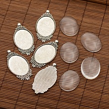 Honeyhandy Tibetan Style Alloy Pendant Cabochon Settings, Oval with Flower and Transparent Oval Glass Cabochons, Antique Silver, Tray: 40x30mm, 63x32x2mm, Hole: 4mm, Glass Cabochons: 40x30x8mm