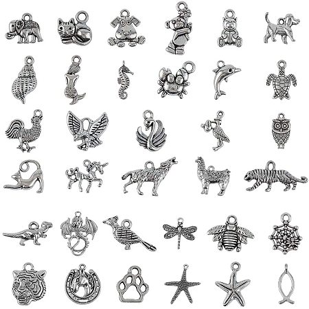 NBEADS 100g Mixed Shapes Tibetan Style Alloy Pendants, 30 Random Mixed Kinds of Metal Seahorse Dolphin Dog Animal Charm Pendants for DIY Necklace Bracelet Arts Projects, Antique Silver
